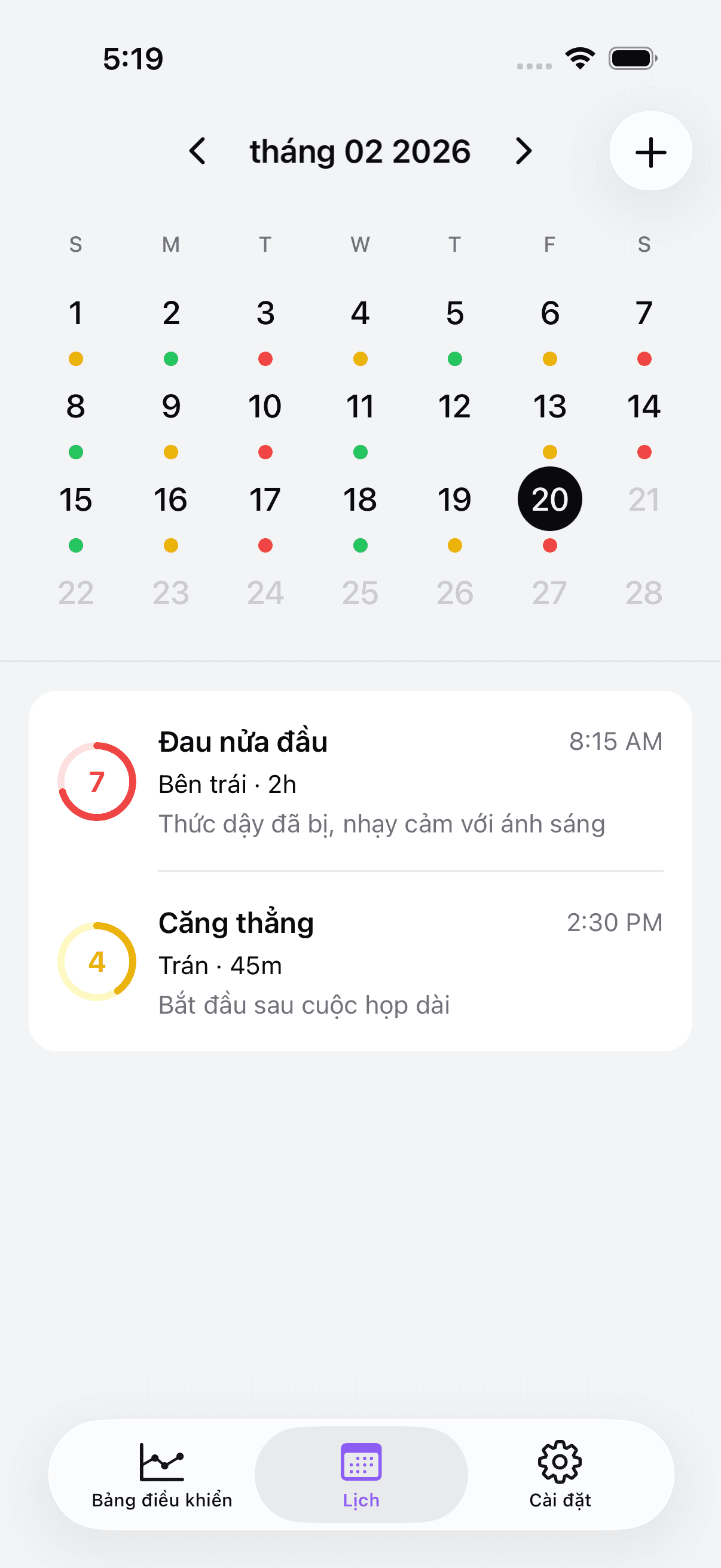 Calendar view with color-coded headache entries
